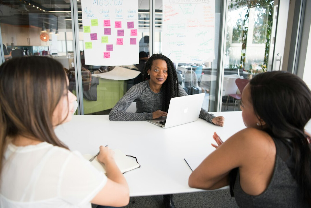 woman leading team discussion